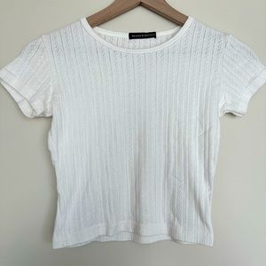 Brandy Melville Ashlyn Eyelet Top — cropped short sleeve white tee